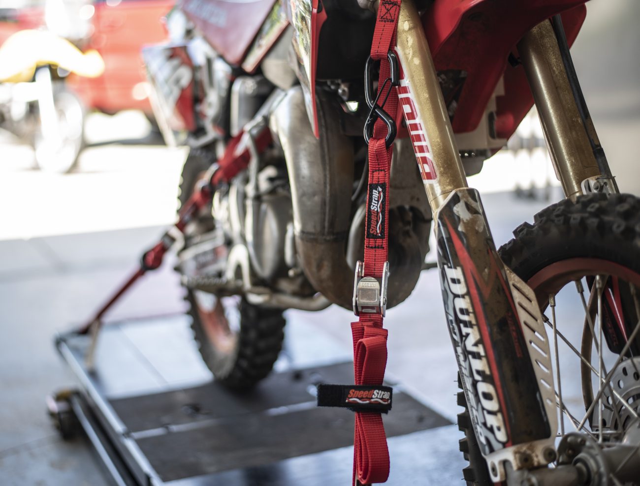 1" Cam-Lock Tie Down on Dirt Bike