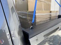 Raised Fit Retractable Tie Down Anchor with Tied Down Cargo in Truck Bed